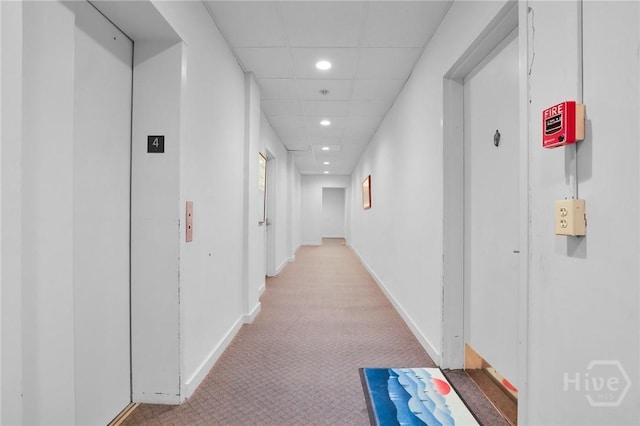 106 W Gwinnett St Unit 4D, Savannah, GA 31401 - corridor with elevator, recessed lighting, light carpet, and a paneled ceiling