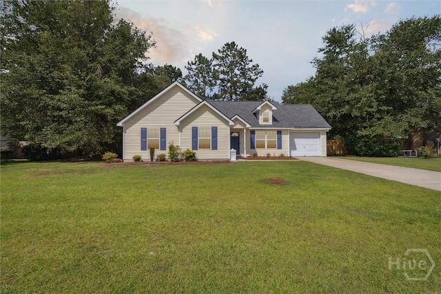 281 Barrister Cir, Guyton, GA 31312 - view of front of house with concrete driveway, a garage, and a front lawn