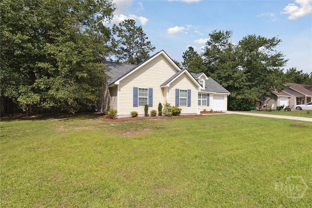 281 Barrister Cir, Guyton, GA 31312 - view of front of property featuring an attached garage, concrete driveway, and a front lawn
