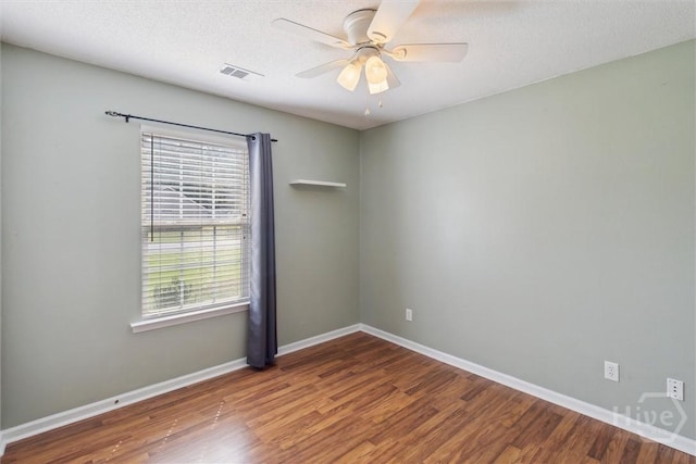 281 Barrister Cir, Guyton, GA 31312 - unfurnished room featuring wood finished floors, ceiling fan, and a textured ceiling