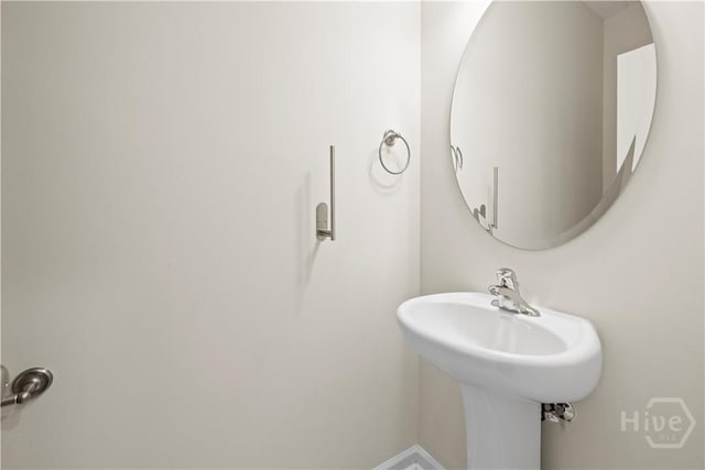 1161 Turpentine Trl, Hinesville, GA 31313 - bathroom with baseboards and a sink