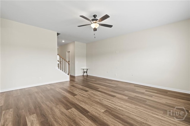 1161 Turpentine Trl, Hinesville, GA 31313 - unfurnished room with ceiling fan, wood finished floors, and stairs