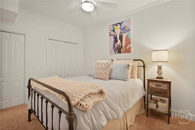 700 Wilmington Island Rd Unit T3, Savannah, GA 31410 - bedroom with light carpet, ornamental molding, two closets, and ceiling fan