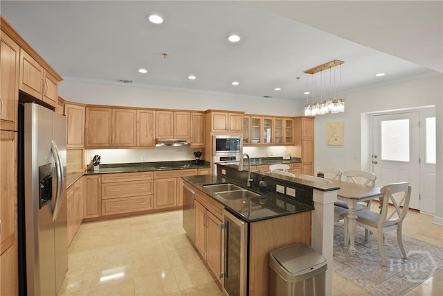700 Wilmington Island Rd Unit T3, Savannah, GA 31410 - kitchen with appliances with stainless steel finishes, wine cooler, ornamental molding, a kitchen island with sink, and under cabinet range hood