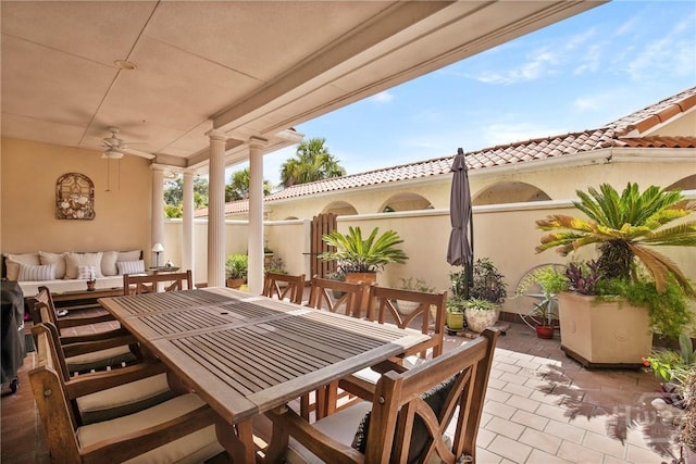 700 Wilmington Island Rd Unit T3, Savannah, GA 31410 - view of patio with outdoor dining area, a ceiling fan, and an outdoor living space