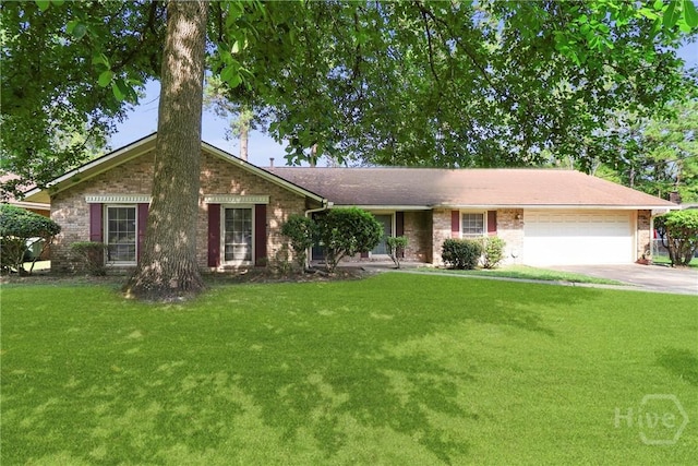 10804 Dorchester Rd, Savannah, GA 31406 - ranch-style home with a garage, a front lawn, concrete driveway, and brick siding