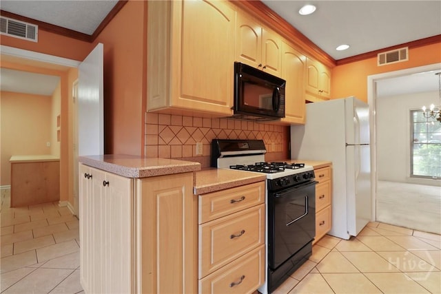 10804 Dorchester Rd, Savannah, GA 31406 - kitchen with black appliances, light tile patterned flooring, light brown cabinetry, backsplash, and a chandelier