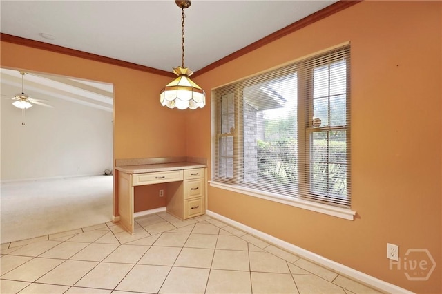 10804 Dorchester Rd, Savannah, GA 31406 - unfurnished dining area with built in desk, crown molding, and a ceiling fan