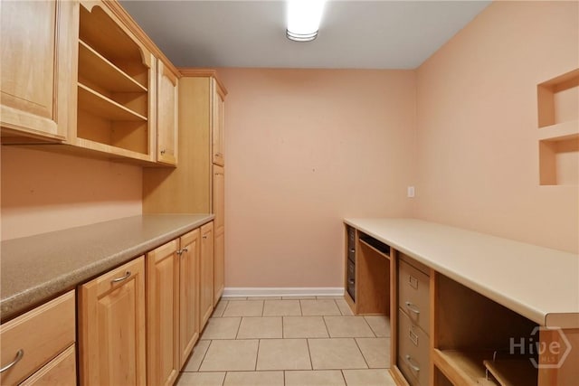 10804 Dorchester Rd, Savannah, GA 31406 - laundry room with light tile patterned floors and baseboards