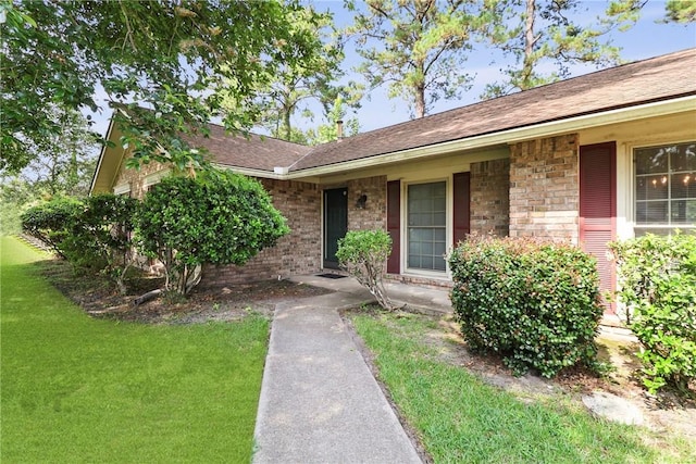 10804 Dorchester Rd, Savannah, GA 31406 - entrance to property featuring brick siding and a lawn
