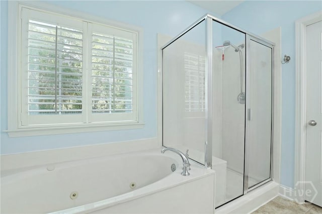 72 Roswell Trl, Richmond Hill, GA 31324 - bathroom with a shower stall and a tub with jets