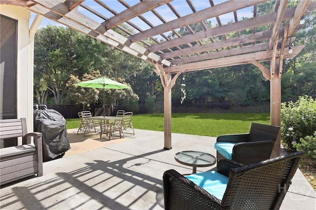 72 Roswell Trl, Richmond Hill, GA 31324 - fenced backyard with a pergola, outdoor dining area, and a patio