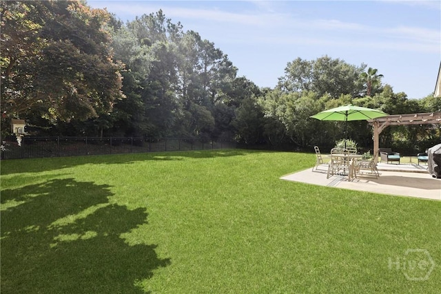 72 Roswell Trl, Richmond Hill, GA 31324 - view of yard featuring a patio and a pergola