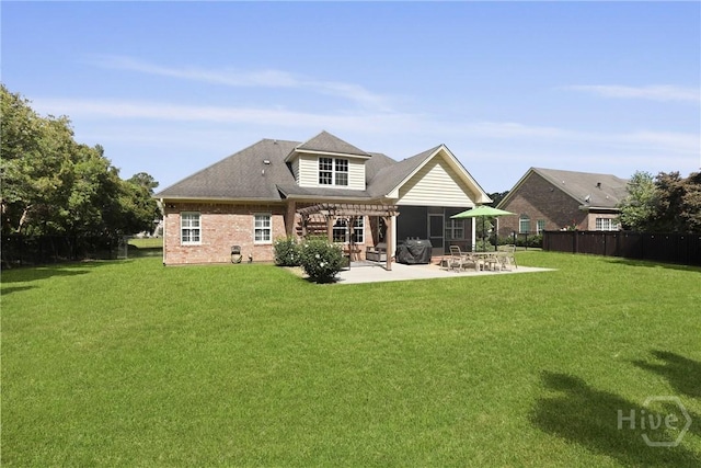 72 Roswell Trl, Richmond Hill, GA 31324 - back of property with a pergola, a patio, brick siding, and roof with shingles