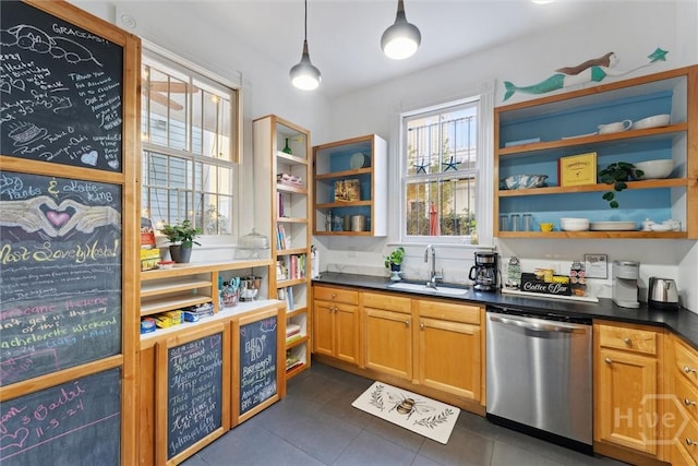 531 E Broad St, Savannah, GA 31401 - kitchen with stainless steel dishwasher, open shelves, dark countertops, dark tile patterned flooring, and decorative light fixtures