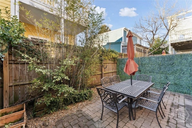 531 E Broad St, Savannah, GA 31401 - fenced backyard with a patio and outdoor dining space