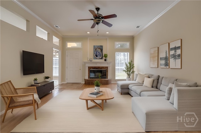 633 Greenwich Dr, Richmond Hill, GA 31324 - living room with healthy amount of natural light, a ceiling fan, ornamental molding, light wood-type flooring, and recessed lighting