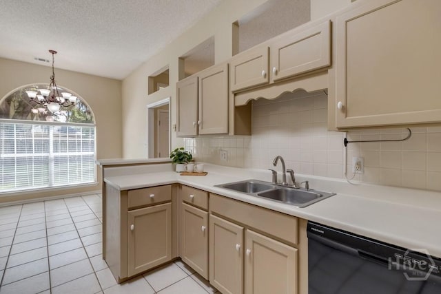 633 Greenwich Dr, Richmond Hill, GA 31324 - kitchen featuring black dishwasher, a peninsula, light tile patterned floors, light countertops, and decorative backsplash