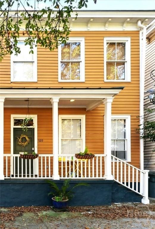 529 E Broad St, Savannah, GA 31401 - view of exterior entry with a porch