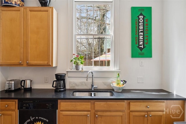 529 E Broad St, Savannah, GA 31401 - kitchen featuring black dishwasher, dark countertops, and plenty of natural light