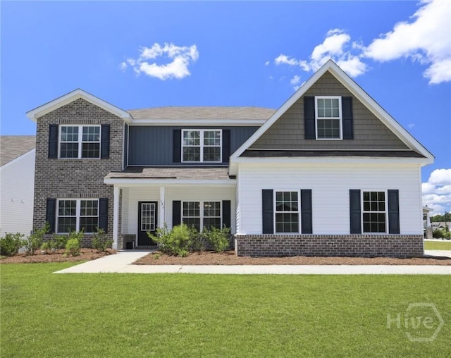 131 Guana Ln, Bloomingdale, GA 31302 - view of front facade with brick siding and a front lawn