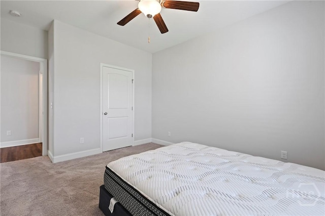 131 Guana Ln, Bloomingdale, GA 31302 - carpeted bedroom with baseboards and ceiling fan