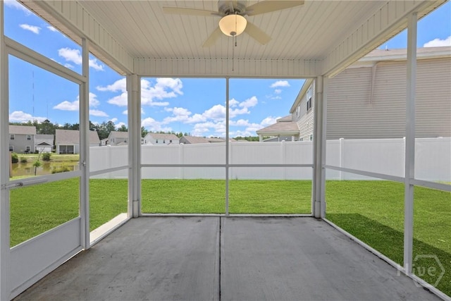 131 Guana Ln, Bloomingdale, GA 31302 - unfurnished sunroom with ceiling fan and a residential view