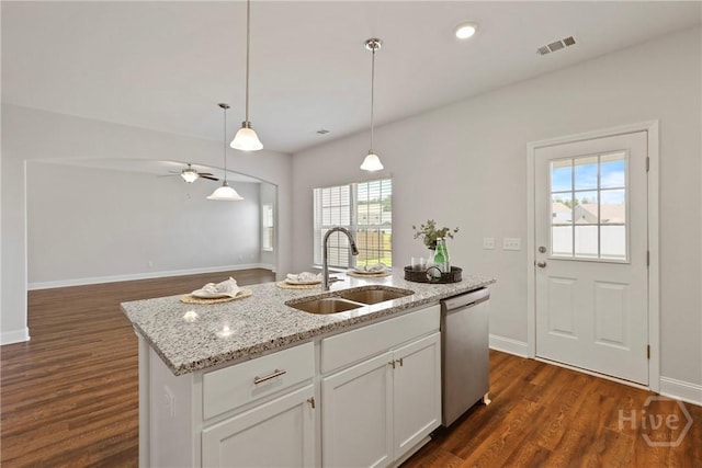 131 Guana Ln, Bloomingdale, GA 31302 - kitchen with stainless steel dishwasher, healthy amount of natural light, and dark wood-style floors