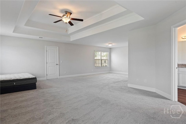 131 Guana Ln, Bloomingdale, GA 31302 - carpeted empty room with a tray ceiling and ceiling fan