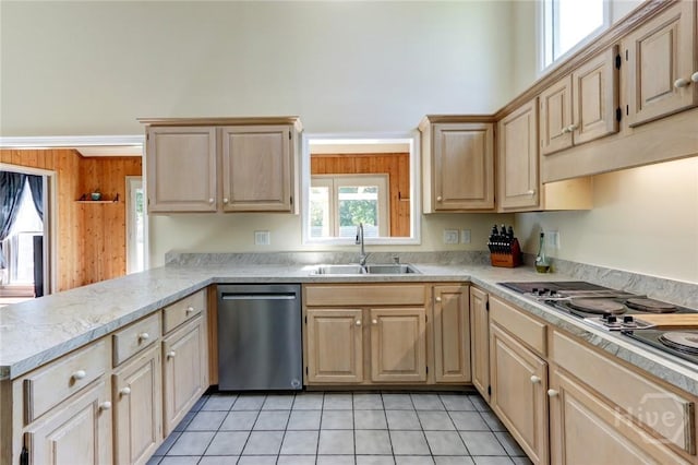 1333 La Vista Cir, Pooler, GA 31322 - kitchen with stainless steel dishwasher, light brown cabinets, a peninsula, and wooden walls