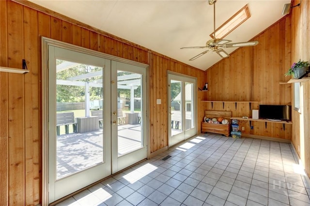 1333 La Vista Cir, Pooler, GA 31322 - doorway to outside featuring lofted ceiling, wood walls, ceiling fan, and tile patterned floors