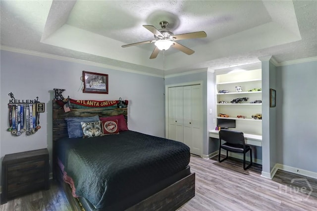 1333 La Vista Cir, Pooler, GA 31322 - bedroom featuring a raised ceiling, wood finished floors, an office area, and a textured ceiling