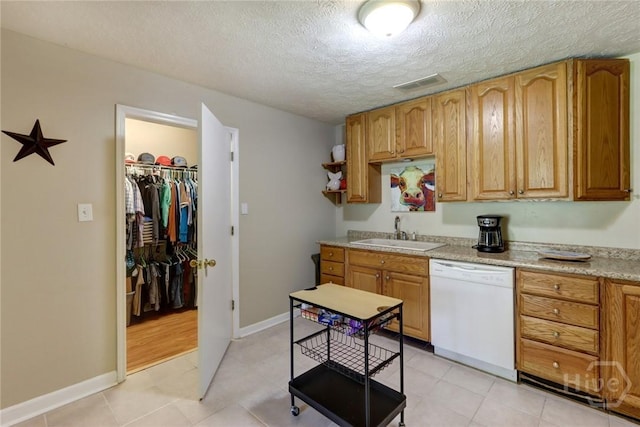 1333 La Vista Cir, Pooler, GA 31322 - kitchen with dishwasher, a textured ceiling, open shelves, brown cabinetry, and light tile patterned floors