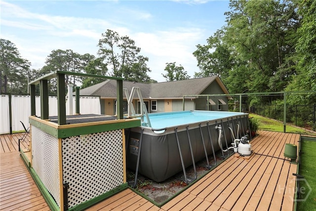 7619 Lynes Ct, Savannah, GA 31406 - wooden deck with an outdoor pool