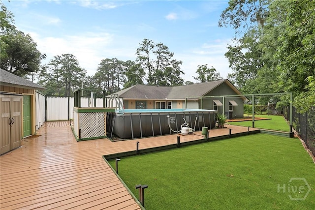 7619 Lynes Ct, Savannah, GA 31406 - back of property with a fenced backyard and a wooden deck