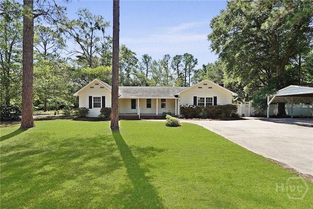 265 Mahan St, Jesup, GA 31545 - view of front of house featuring driveway and a porch