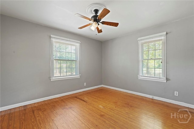 265 Mahan St, Jesup, GA 31545 - unfurnished room with light wood-type flooring and a ceiling fan