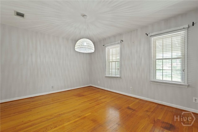 265 Mahan St, Jesup, GA 31545 - unfurnished dining area with hardwood / wood-style floors