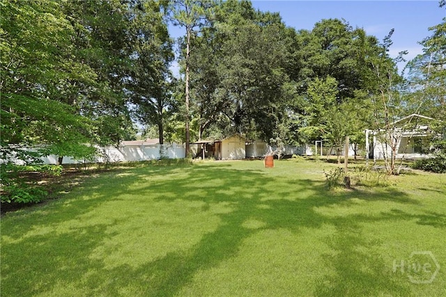 265 Mahan St, Jesup, GA 31545 - view of yard featuring an outdoor structure