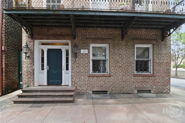 24 E Jones St, Savannah, GA 31401 - view of exterior entry with brick siding