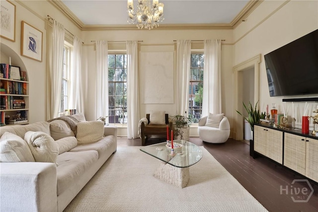 24 E Jones St, Savannah, GA 31401 - living room featuring dark wood finished floors, a chandelier, and crown molding