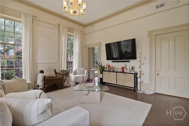 24 E Jones St, Savannah, GA 31401 - living room with a chandelier, plenty of natural light, crown molding, and wood finished floors