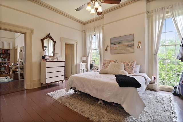 24 E Jones St, Savannah, GA 31401 - bedroom featuring multiple windows, crown molding, dark wood finished floors, and ceiling fan