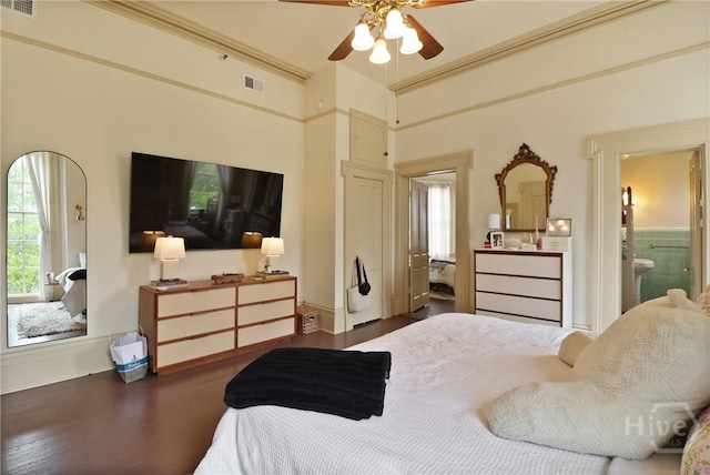 24 E Jones St, Savannah, GA 31401 - bedroom with wood finished floors, ensuite bathroom, and ceiling fan