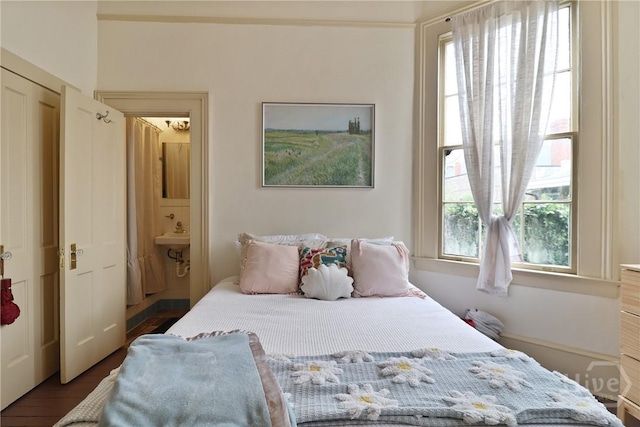 24 E Jones St, Savannah, GA 31401 - bedroom featuring dark wood-style floors and ensuite bath