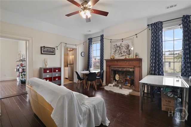 24 E Jones St, Savannah, GA 31401 - living room featuring wood-type flooring, ceiling fan, and a brick fireplace