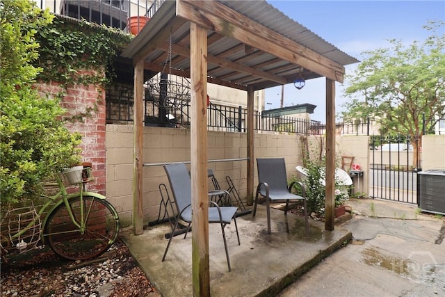 24 E Jones St, Savannah, GA 31401 - view of patio featuring a gate