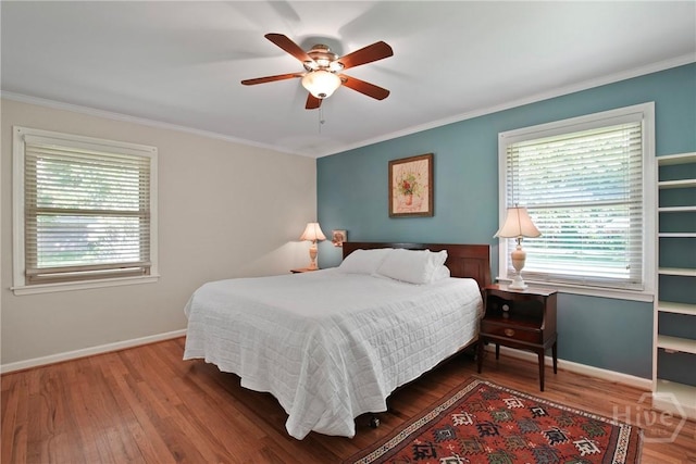206 Devonshire Rd, Savannah, GA 31410 - bedroom with multiple windows, crown molding, wood finished floors, and ceiling fan