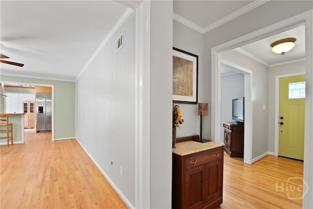 206 Devonshire Rd, Savannah, GA 31410 - foyer with light wood-style flooring, ceiling fan, and ornamental molding