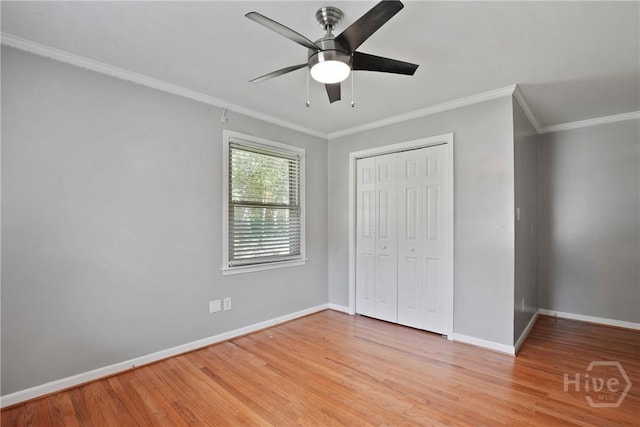 206 Devonshire Rd, Savannah, GA 31410 - unfurnished bedroom featuring light wood-type flooring, crown molding, a closet, and ceiling fan